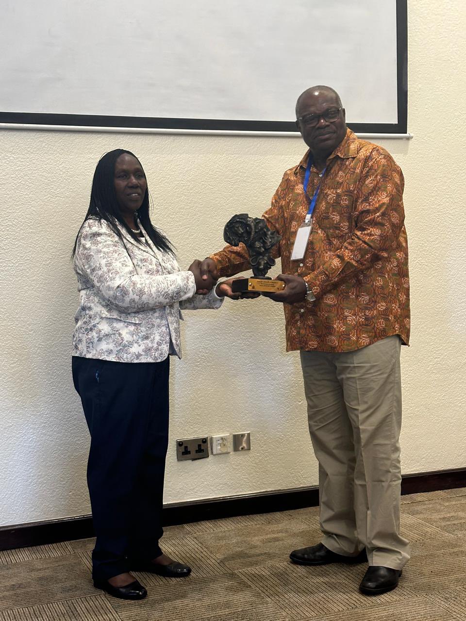 Deputy Vice Chancellor (RIE) Prof Hutchinson and management of University of Nairobi presented this beautiful retirement gift to Prof. Ernest Aryeetey